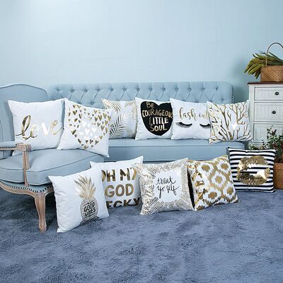 Декоративная подушка бело-бронзового цвета